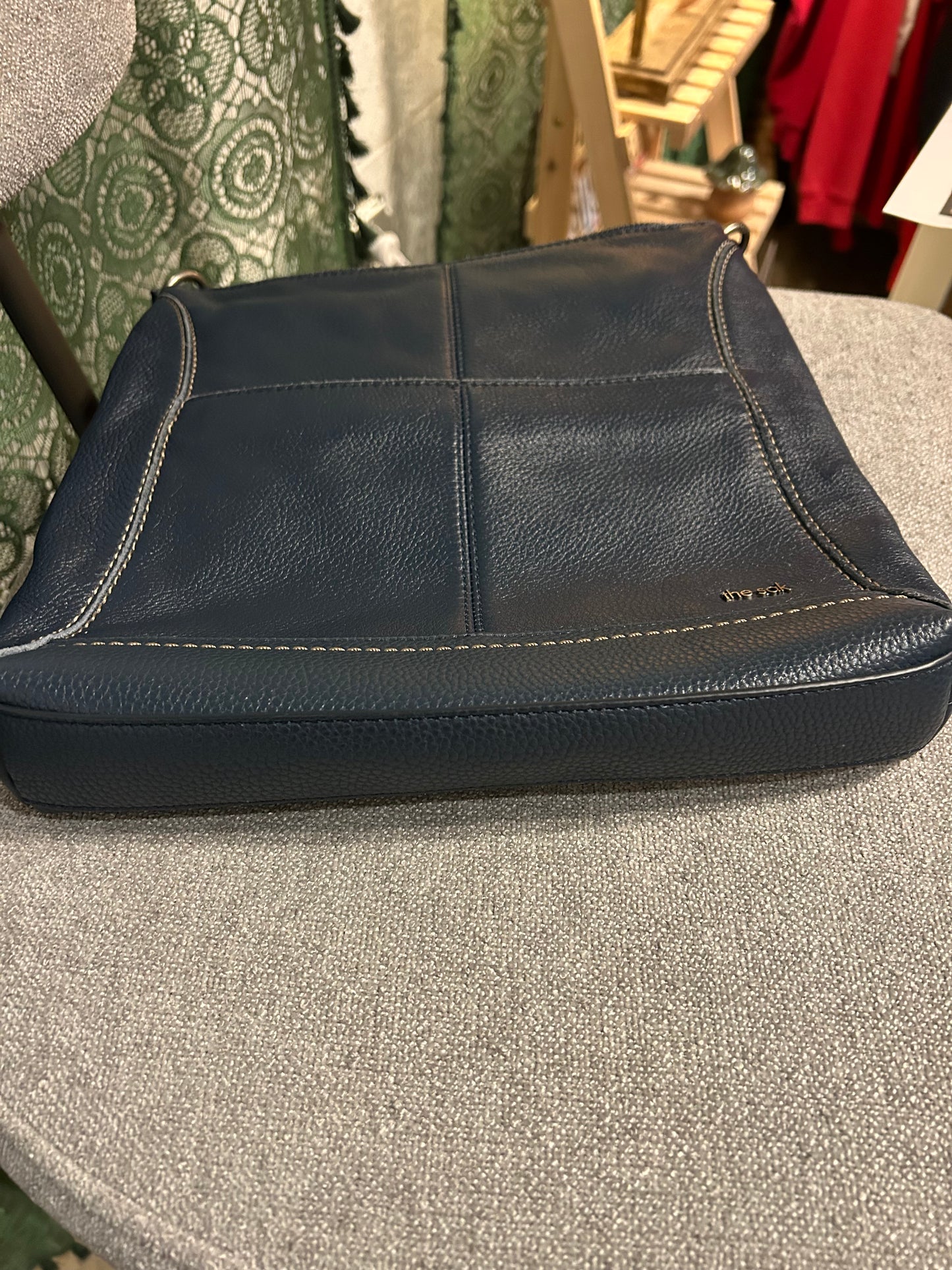 The Sak Dark Blue Shoulder Bag Adjustable Strap Zipper Pebbled Finish
