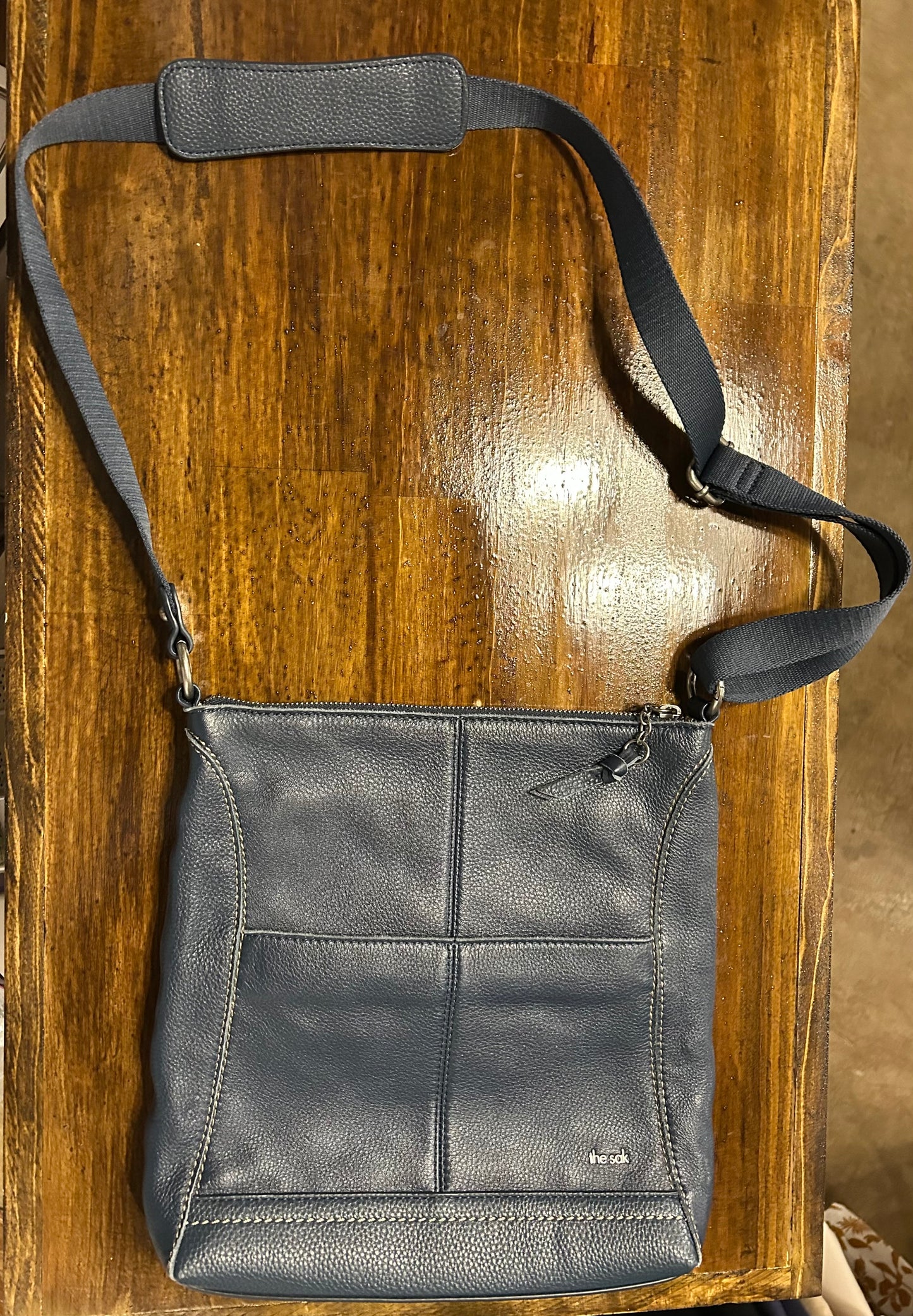 The Sak Dark Blue Shoulder Bag Adjustable Strap Zipper Pebbled Finish